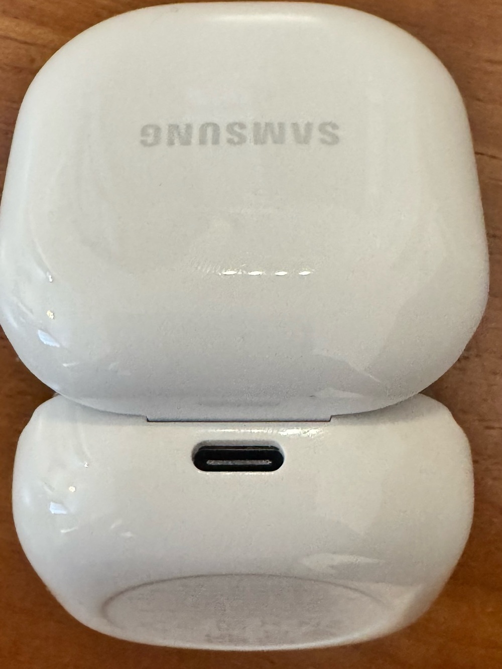 Samsung White Earbuds Charging Case with Regulatory Markings